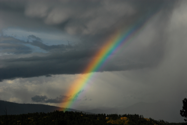rainbow over the Selkirk Mountains