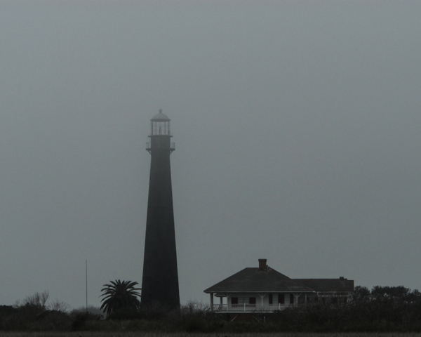 lighthouse in fog on Bolivar Peninsula, Texas