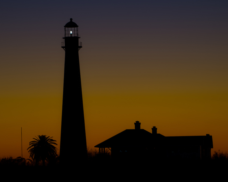 Lighthouse at sunset on Point Bolivar, Texas
