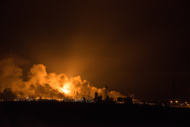 Oil refinery flaring at night in Brazoria County TX